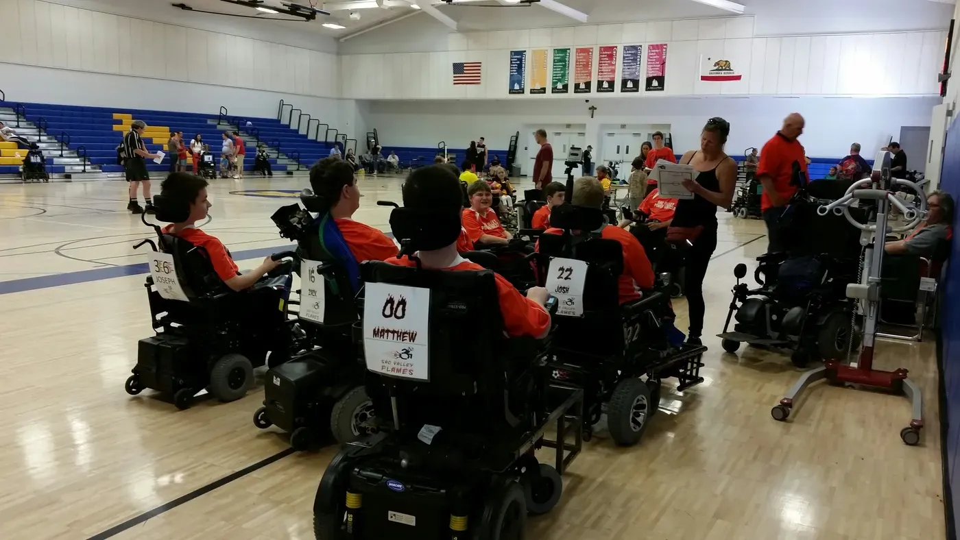 Whitney and Daniel Ramsey at the 2014 wheelchair donation